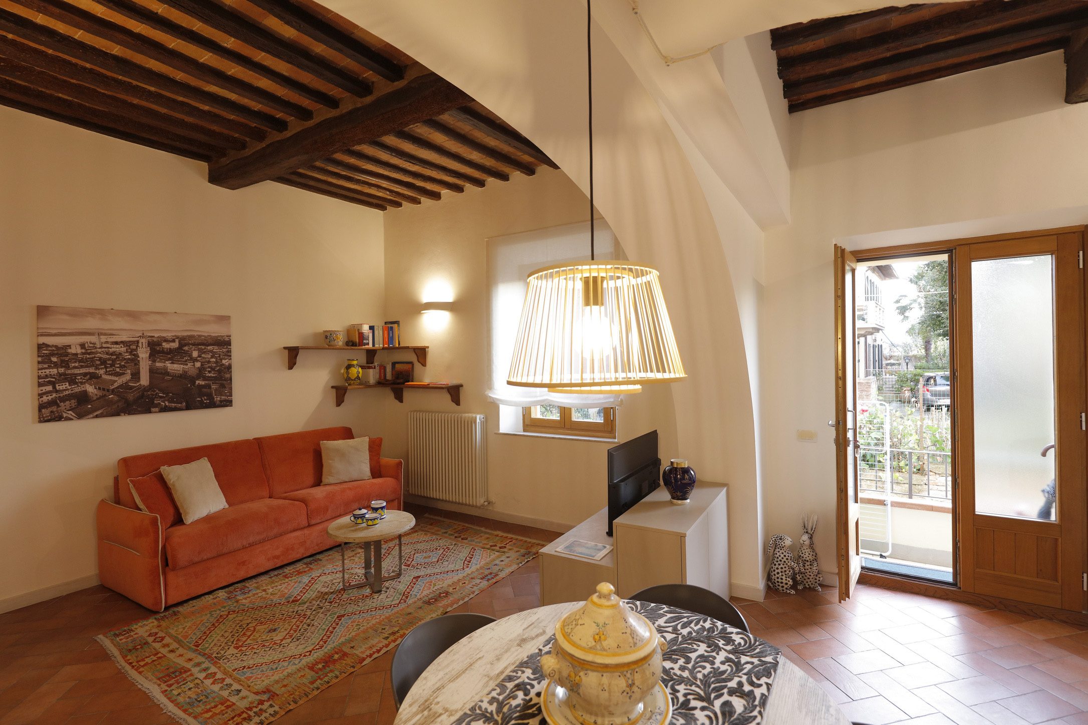 Soggiorno con accesso al terrazzo dell'appartamento Lovely